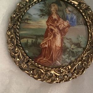 Vintage Gold Brooch with Ornate Design